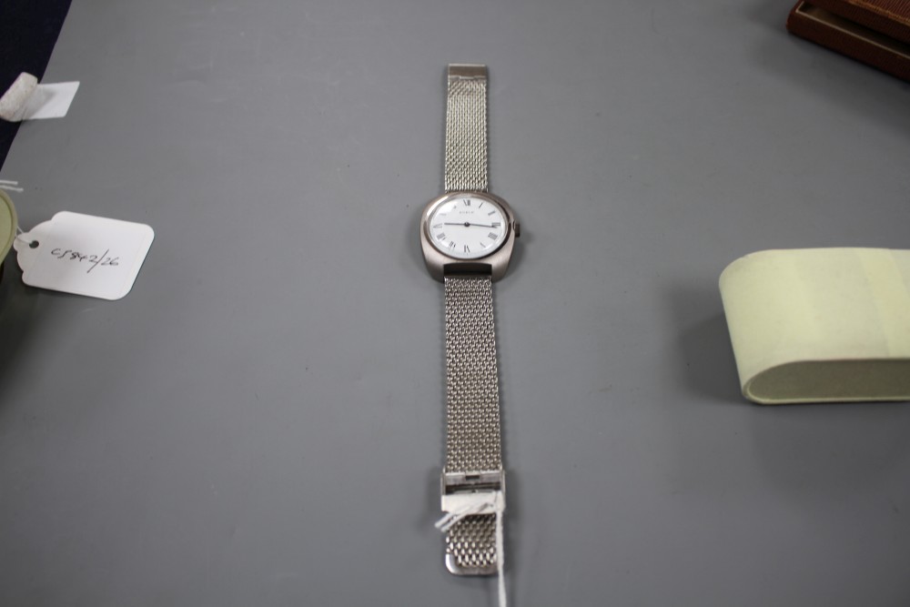 A gentlemans stainless steel Edele manual wind wrist watch, with Roman dial, on mesh link stainless steel bracelet.